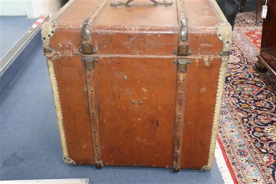 A Victorian leather covered wooden bound trunk W.60cm